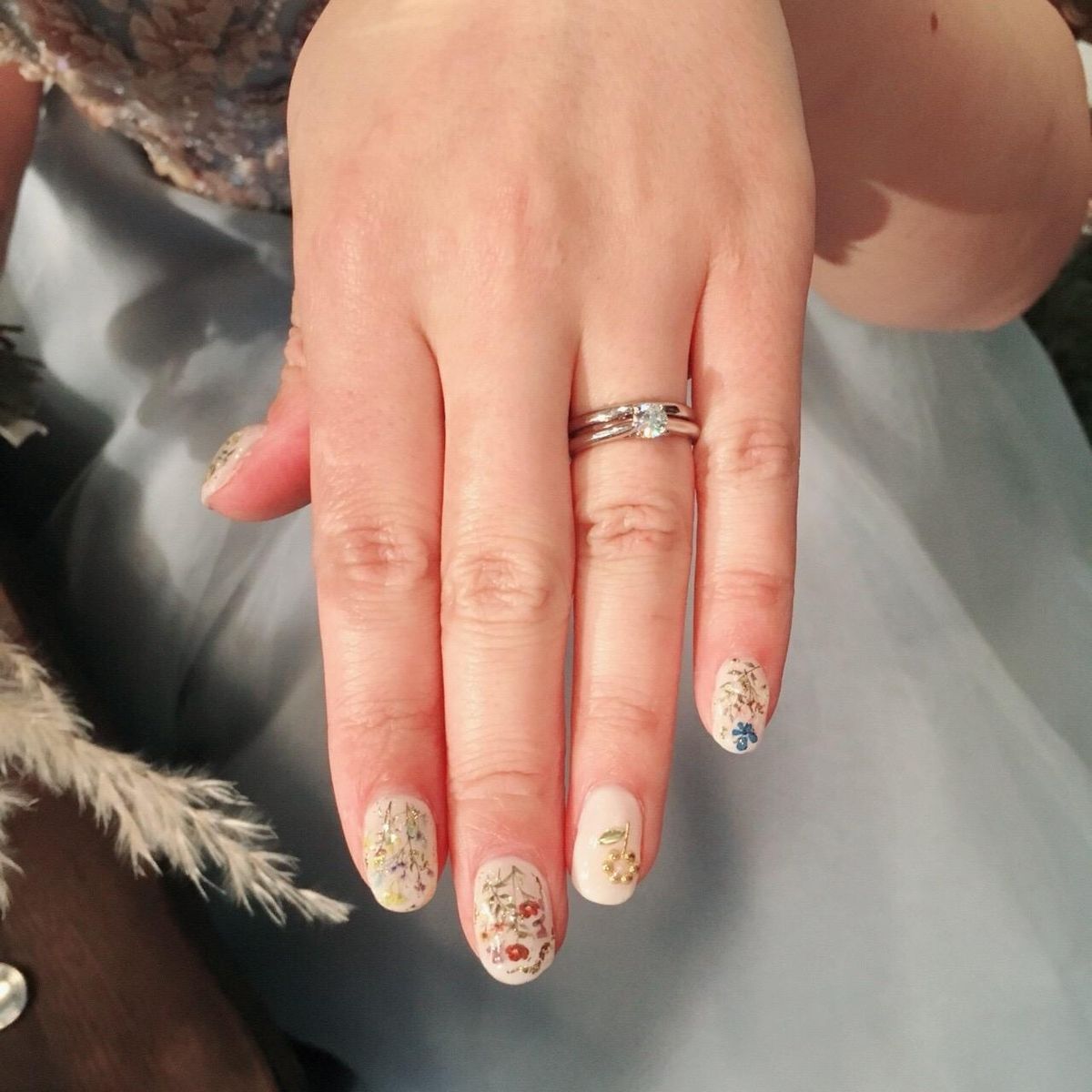 ソリティアデザインの婚約指輪