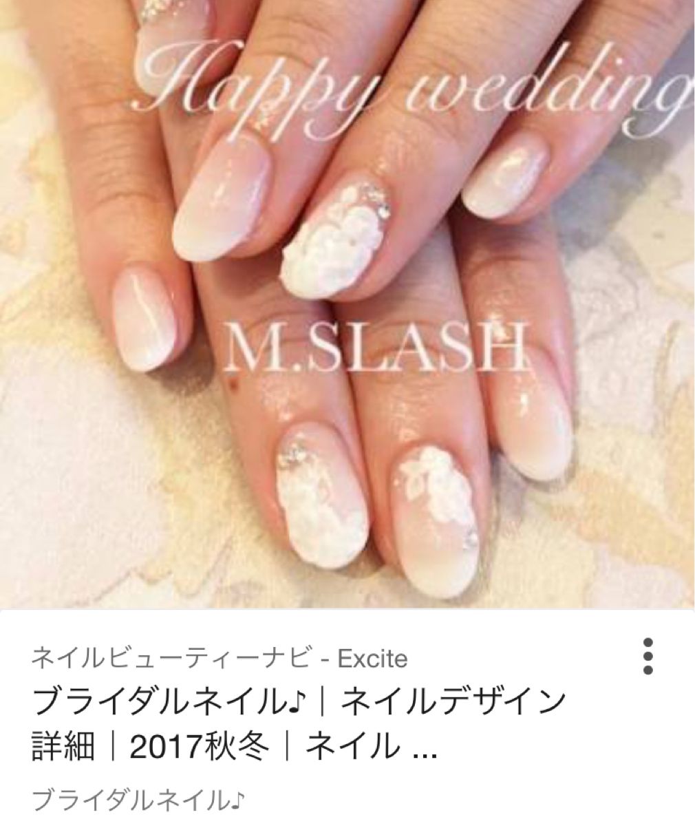 先輩花嫁 アキ のネイルの写真21