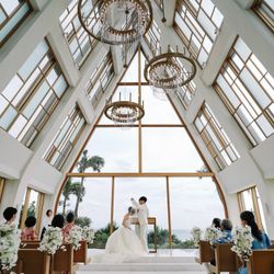美らの教会（ザ・ギノザリゾート）で挙げたchiiiia.wdさんの結婚披露宴・挙式カバー写真1枚目